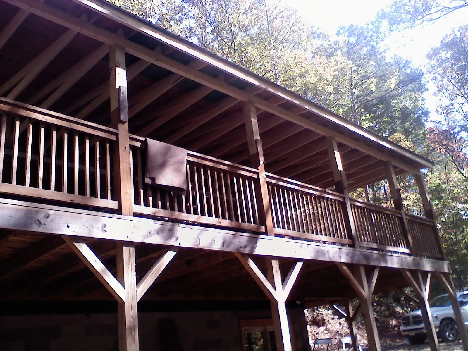 Timber framing under a new elevated porch and deck — Roof Leak Repair in Boothville by Roofing Brothers